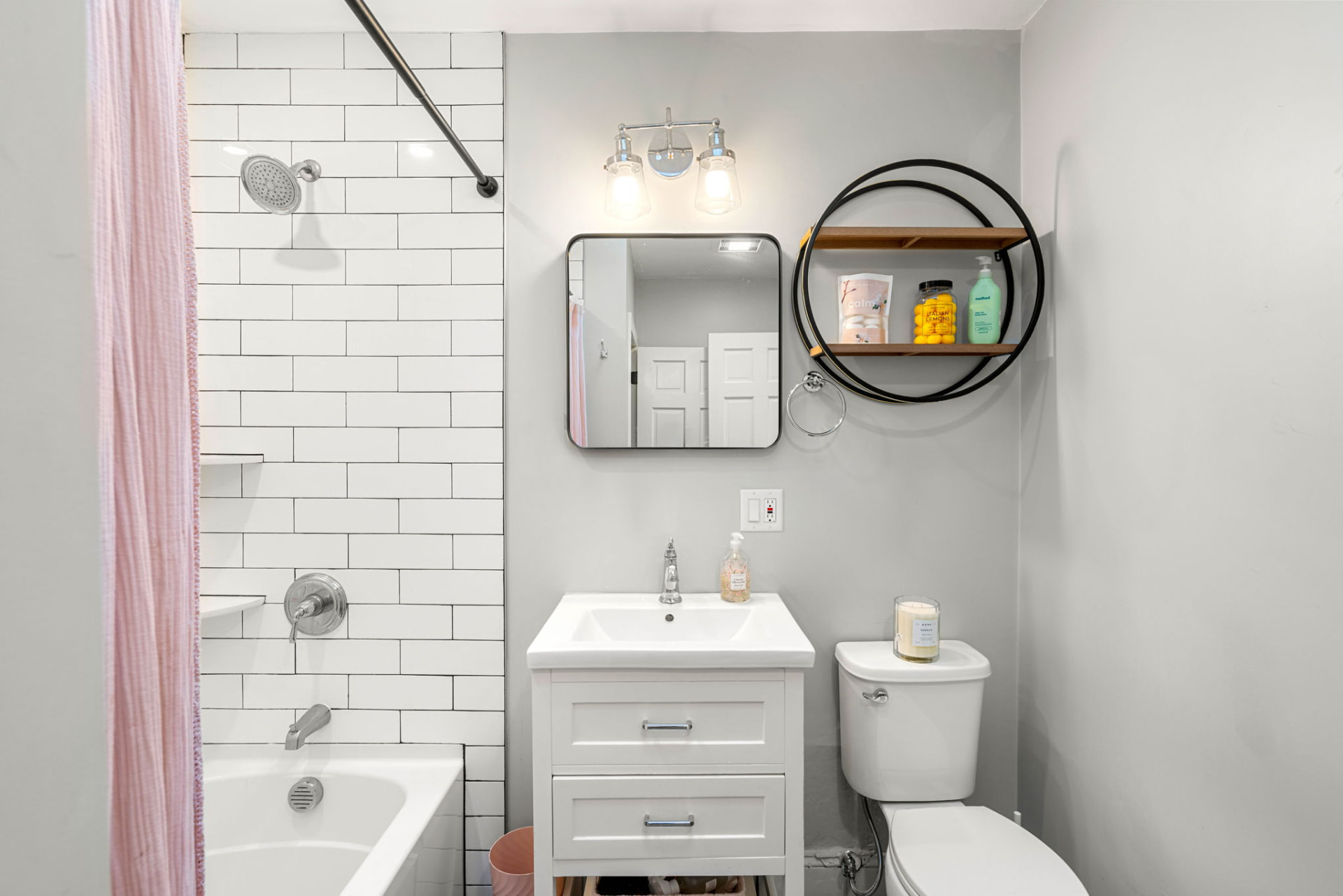 Subway-tiled full bath with soaking tub